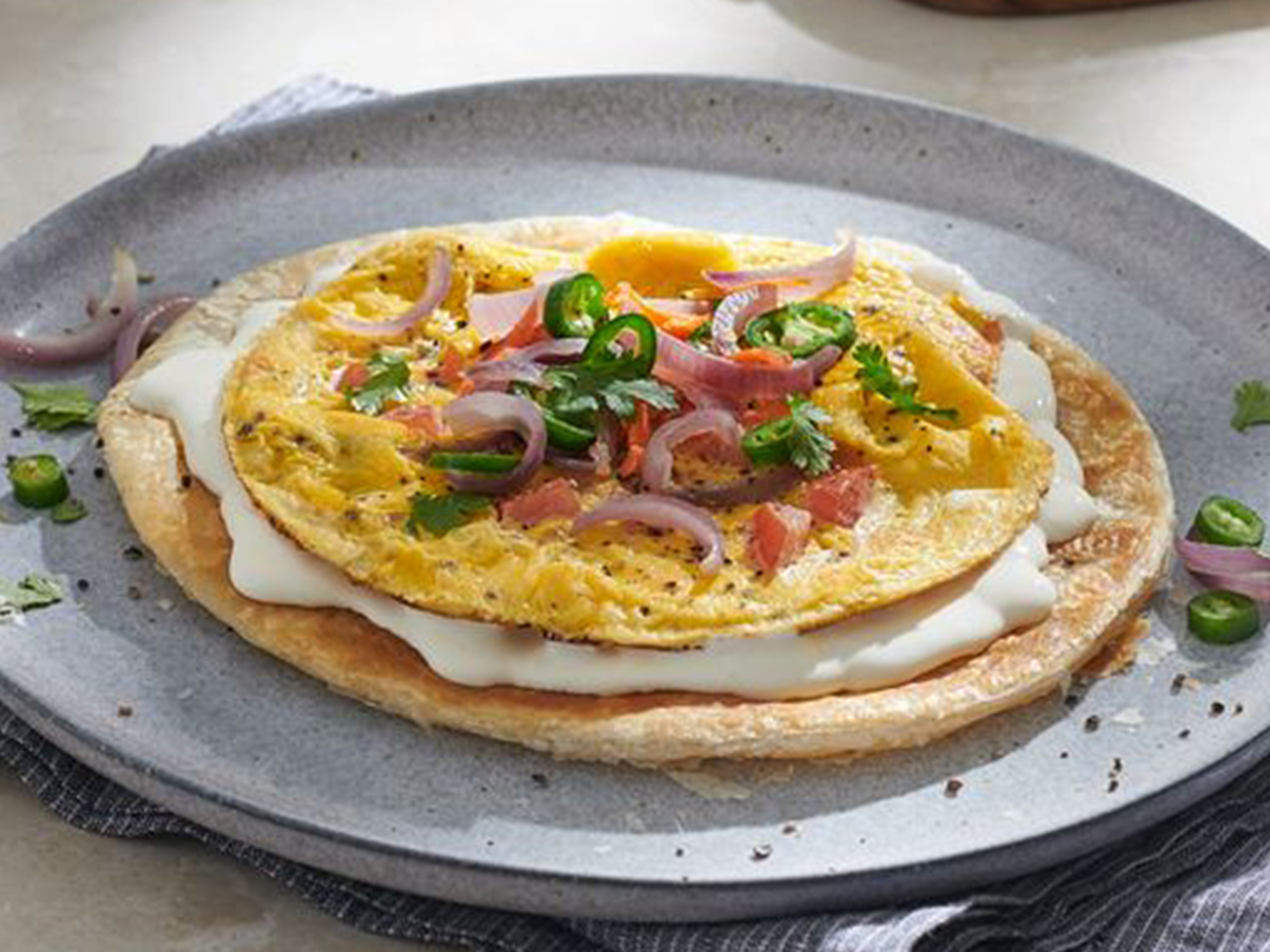 خبز البراتا مع جبنة كريم من بوك والبيض المخفوق