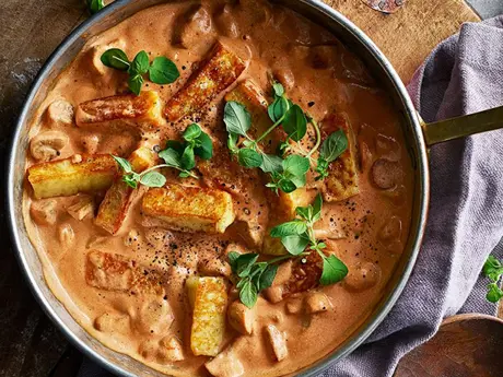 Stroganoff with cheese and mushrooms