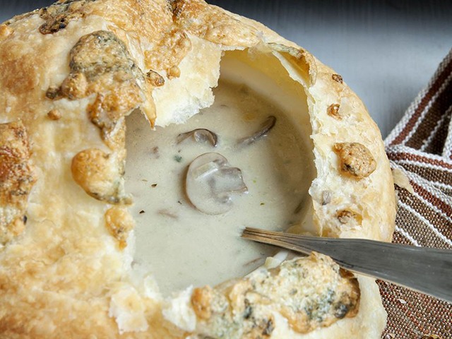 Mushroom soup with puff pastry lid