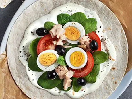 Wrap Nicoise with cream cheese, tuna, vegetables and eggs