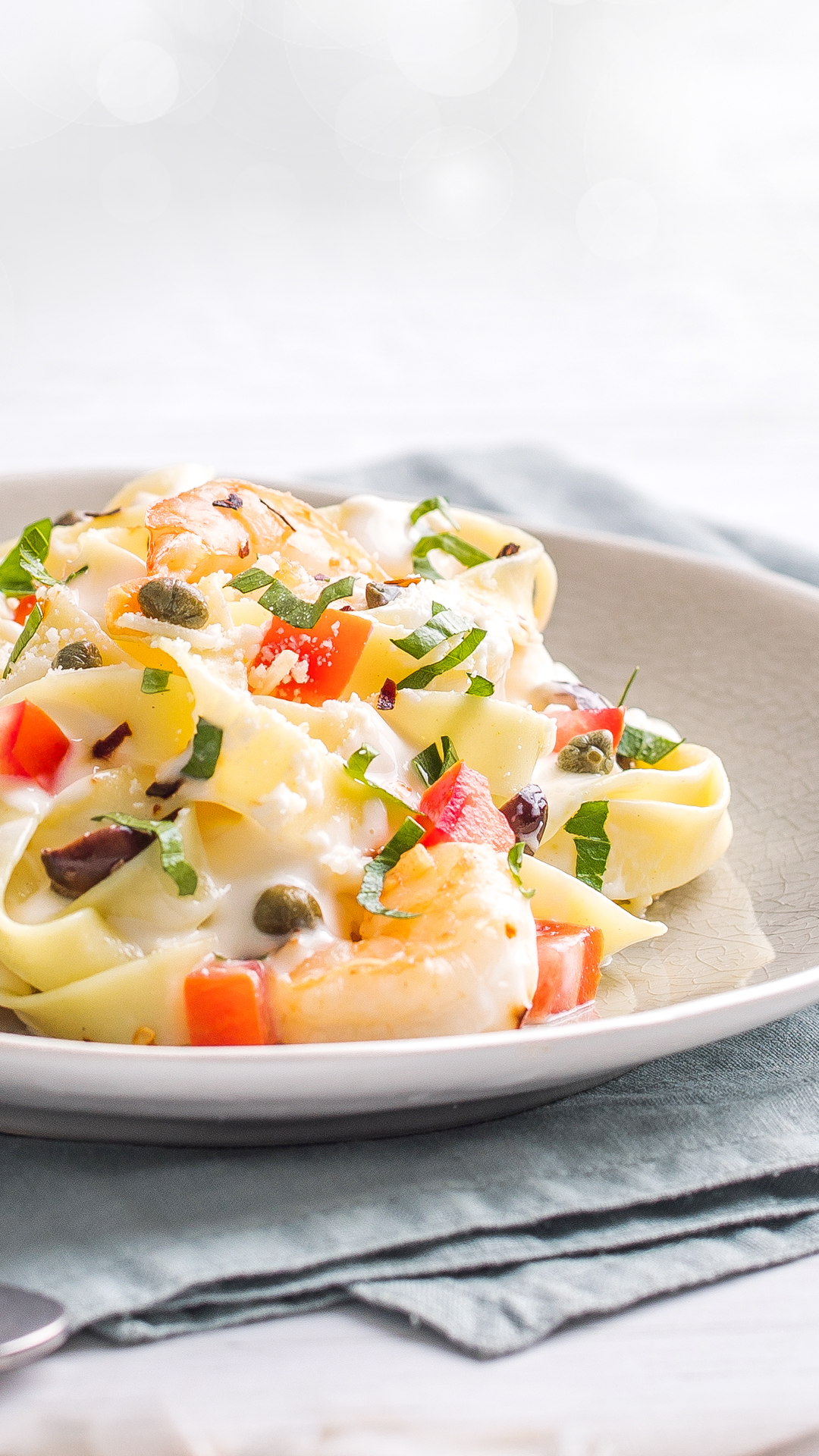 Shrimp fettuccine with creamy bechamel sauce and cheese
